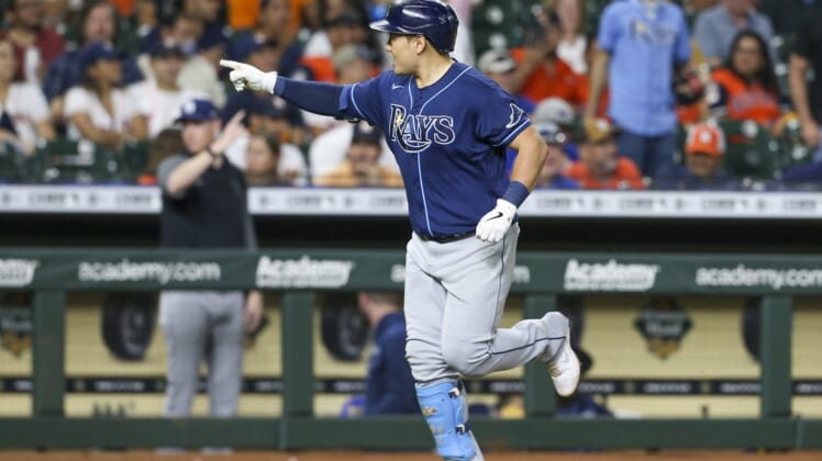 Sep 29, 2021; Houston, Texas, USA; Tampa Bay Rays first baseman Ji-Man Choi (26) reacts to his three run home run against the Houston Astros in the fifth inning at Minute Maid Park. Mandatory Credit: Thomas Shea-USA TODAY Sports