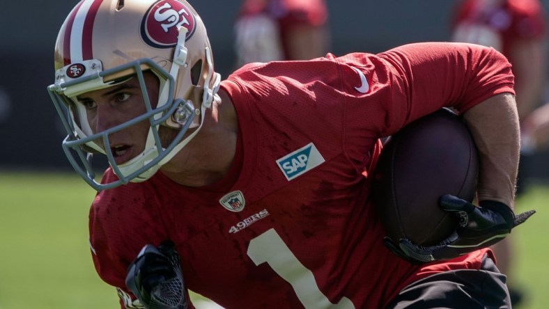 Jul 26, 2018; Santa Clara, CA, USA; San Francisco 49ers wide receiver Max McCaffrey (1) runs with the football during training camp at the SAP Performance Facility. Mandatory Credit: Stan Szeto-USA TODAY Sports