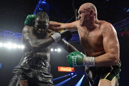 Feb 22, 2020; Las Vegas, Nevada, USA; Deontay Wilder and Tyson Fury box during their WBC heavyweight title bout at MGM Grand Garden Arena. Fury won via seventh round TKO. Mandatory Credit: Joe Camporeale-USA TODAY Sports