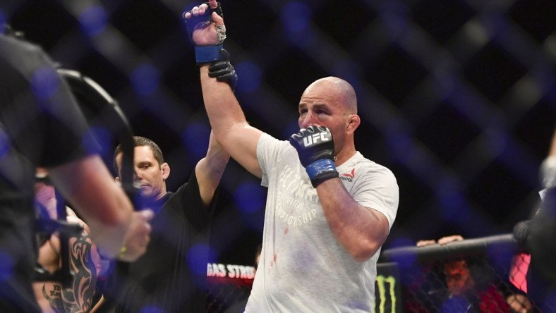 May 13, 2020; Jacksonville, Florida, USA; Glover Teixeira (blue gloves) celebrates after defeating Anthony Smith (red gloves) during UFC Fight Night at VyStar Veterans Memorial Arena. Mandatory Credit: Jasen Vinlove-USA TODAY Sports