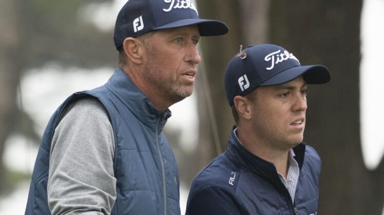 Aug 4, 2020; San Francisco, California, USA; Justin Thomas (right) talks to caddie Jim Mackay (left) on the 15th hole during a practice round of the PGA Championship golf tournament at TPC Harding Park. Mandatory Credit: Kyle Terada-USA TODAY Sports