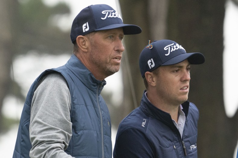 Aug 4, 2020; San Francisco, California, USA; Justin Thomas (right) talks to caddie Jim Mackay (left) on the 15th hole during a practice round of the PGA Championship golf tournament at TPC Harding Park. Mandatory Credit: Kyle Terada-USA TODAY Sports