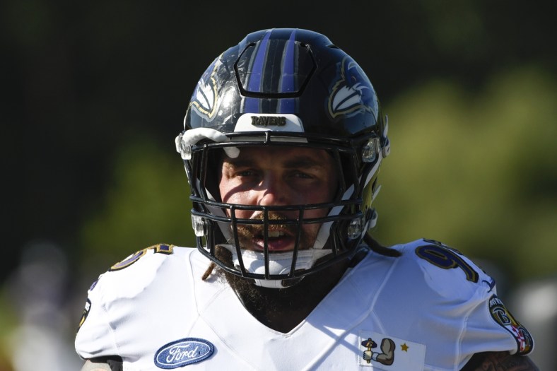 Aug 18, 2020; Owings Mills, Maryland, USA; Baltimore Ravens defensive end Derek Wolfe (95) stands on the field during the morning session of training camp at Under Armour Performance Center. Mandatory Credit: Tommy Gilligan-USA TODAY Sports