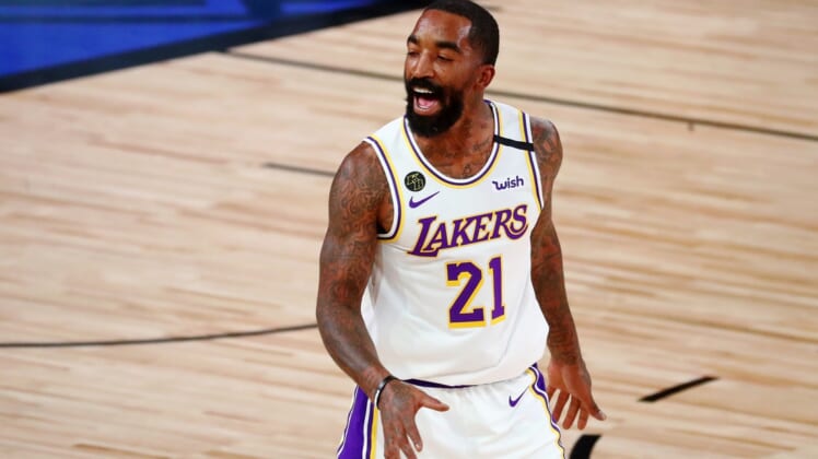 Oct 4, 2020; Orlando, Florida, USA; Los Angeles Lakers guard JR Smith (21) celebrates after making a three point basket against the Miami Heat during the second quarter of game three of the 2020 NBA Finals at AdventHealth Arena. Mandatory Credit: Kim Klement-USA TODAY Sports