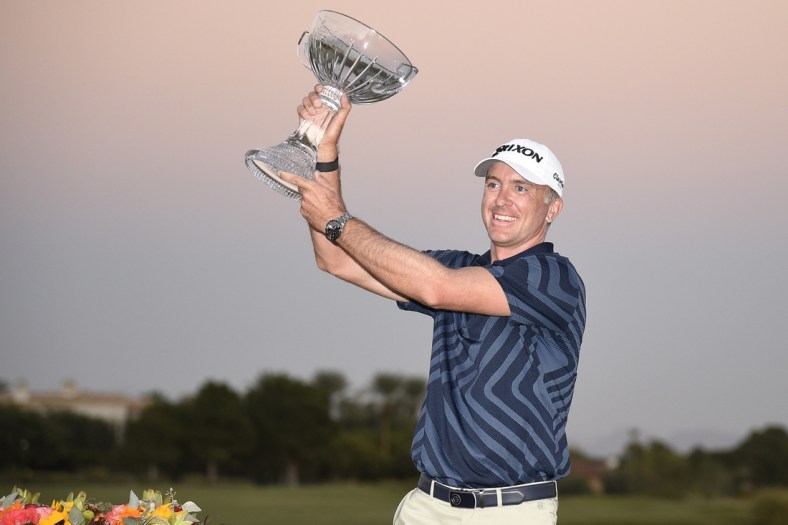 Oct 11, 2020; Las Vegas, Nevada, USA; Martin Laird poses with the Shriner trophy after winning the Shriners Hospitals for Children Open golf tournament at TPC Summerlin. Mandatory Credit: Kelvin Kuo-USA TODAY Sports