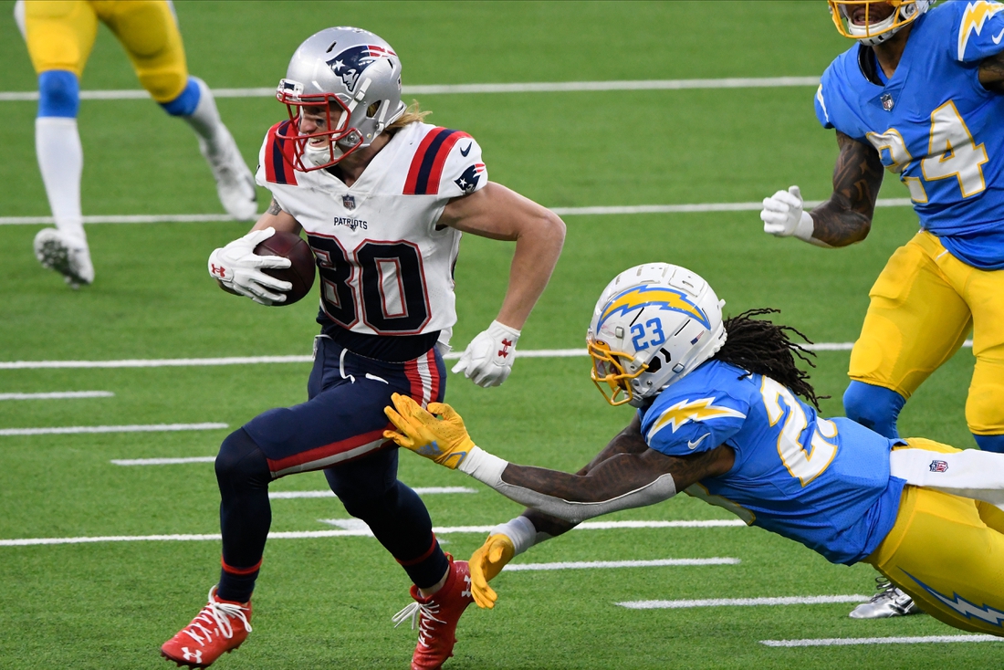 Dec 6, 2020; Inglewood, California, USA; New England Patriots wide receiver Gunner Olszewski (80) runs past Los Angeles Chargers strong safety Rayshawn Jenkins (23) in the fourth quarter at SoFi Stadium. Mandatory Credit: Robert Hanashiro-USA TODAY Sports