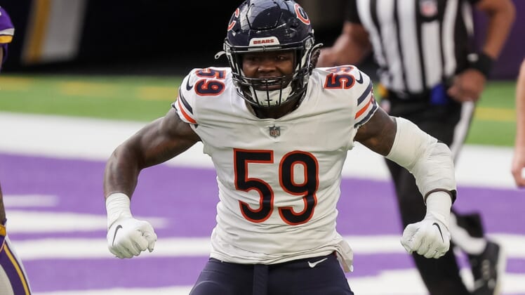 Dec 20, 2020; Minneapolis, Minnesota, USA; Chicago Bears linebacker Danny Trevathan (59) celebrates a tackle in the first quarter against the Minnesota Vikings at U.S. Bank Stadium. Mandatory Credit: Brad Rempel-USA TODAY Sports