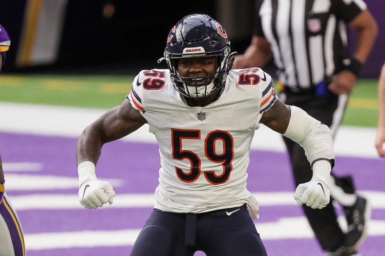 Dec 20, 2020; Minneapolis, Minnesota, USA; Chicago Bears linebacker Danny Trevathan (59) celebrates a tackle in the first quarter against the Minnesota Vikings at U.S. Bank Stadium. Mandatory Credit: Brad Rempel-USA TODAY Sports