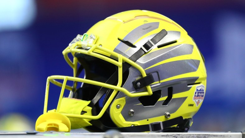 Jan 2, 2021; Glendale, AZ, USA; Detailed view of an Oregon Ducks helmet during the Fiesta Bowl at State Farm Stadium. Mandatory Credit: Mark J. Rebilas-USA TODAY Sports