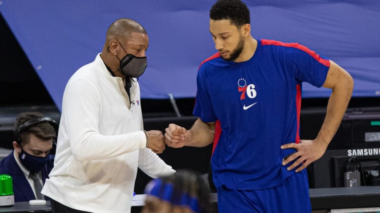 Jan 27, 2021; Philadelphia, Pennsylvania, USA; Philadelphia 76ers guard Ben Simmons (R) fist bumps head coach Doc Rivers (L) before a game against the Los Angeles Lakers at Wells Fargo Center. Mandatory Credit: Bill Streicher-USA TODAY Sports