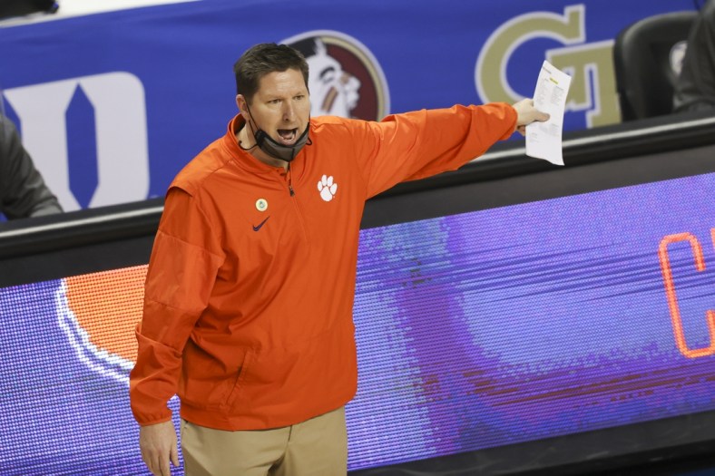 Mar 10, 2021; Greensboro, North Carolina, USA; Clemson Tigers head coach Brad Brownell yells at an official as his team plays the Miami Hurricanes during the second half in the second round of the 2021 ACC tournament at Greensboro Coliseum. The Miami Hurricanes won 67-64. Mandatory Credit: Nell Redmond-USA TODAY Sports