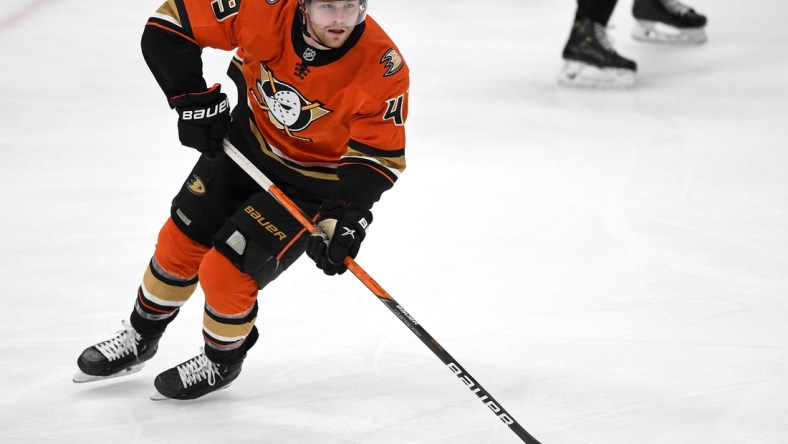 May 1, 2021; Anaheim, California, USA;  Anaheim Ducks left wing Max Jones (49) takes the puck down ice in the first period of the game against the Anaheim Ducks at Honda Center. Mandatory Credit: Jayne Kamin-Oncea-USA TODAY Sports