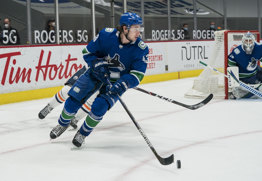 May 3, 2021; Vancouver, British Columbia, CAN; Vancouver Canucks defenseman Quinn Hughes (43) skates against the Edmonton Oilers in the third period at Rogers Arena. Oilers won 5-3. Mandatory Credit: Bob Frid-USA TODAY Sports