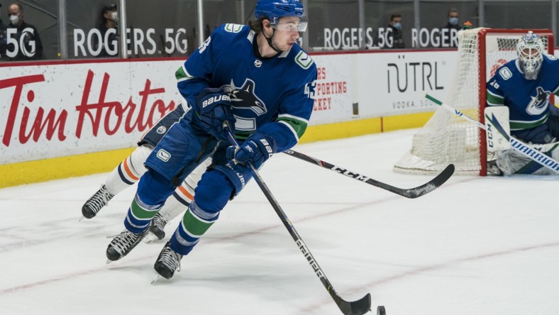 May 3, 2021; Vancouver, British Columbia, CAN; Vancouver Canucks defenseman Quinn Hughes (43) skates against the Edmonton Oilers in the third period at Rogers Arena. Oilers won 5-3. Mandatory Credit: Bob Frid-USA TODAY Sports