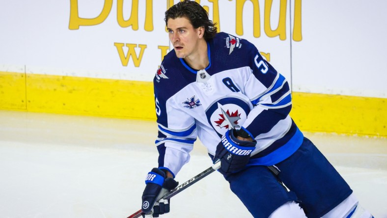 May 5, 2021; Calgary, Alberta, CAN; Winnipeg Jets center Mark Scheifele (55) skates during the warmup period against the Calgary Flames at Scotiabank Saddledome. Mandatory Credit: Sergei Belski-USA TODAY Sports