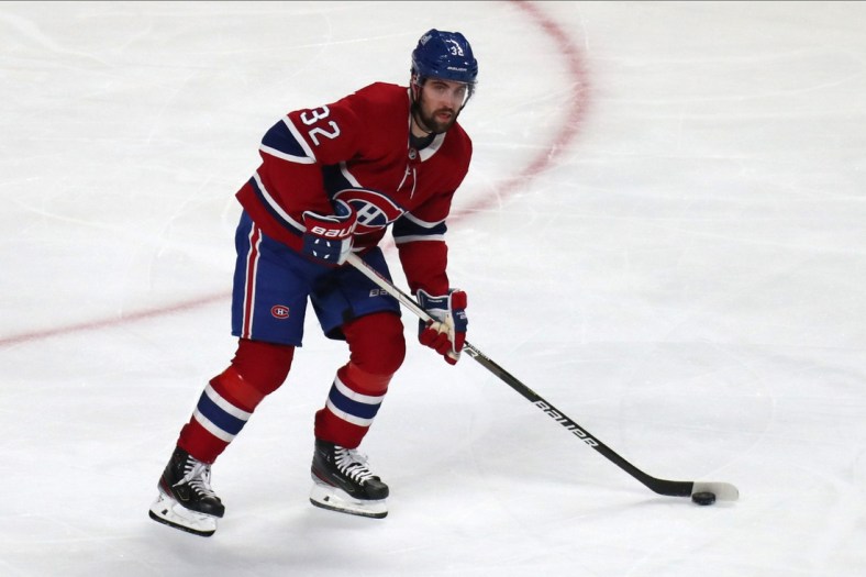 Jun 24, 2021; Montreal, Quebec, CAN; Montreal Canadiens defenseman Erik Gustafsson (32) skates with the puck against Vegas Golden Knights during the second period in game six of the 2021 Stanley Cup Semifinals at Bell Centre. Mandatory Credit: Jean-Yves Ahern-USA TODAY Sports