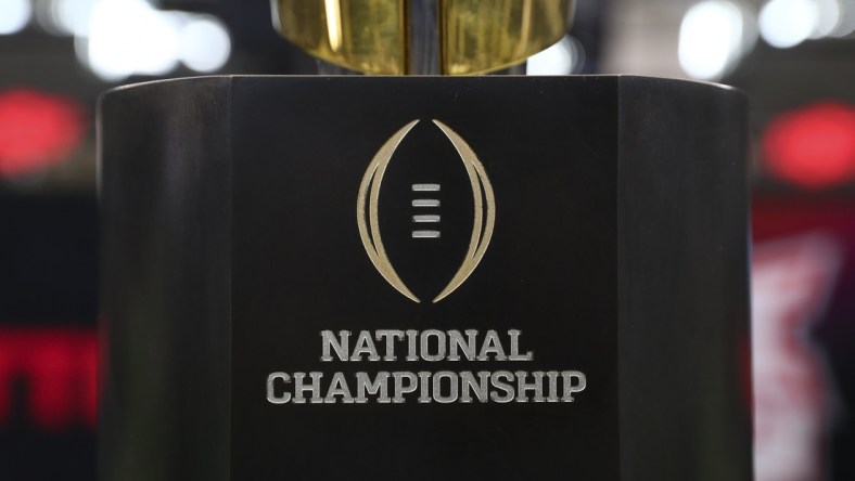 Jul 15, 2021; Arlington, TX, USA;  The College Football playoff national championship trophy is displayed during Big 12 media days at AT&T Stadium. Mandatory Credit: Kevin Jairaj-USA TODAY Sports