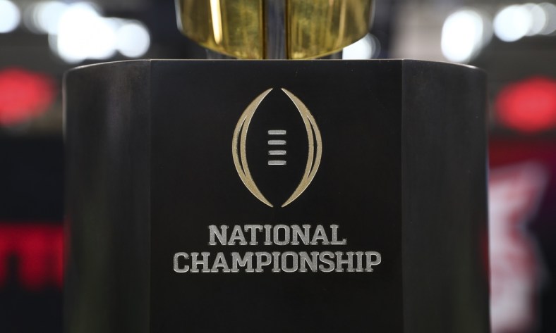Jul 15, 2021; Arlington, TX, USA;  The College Football playoff national championship trophy is displayed during Big 12 media days at AT&T Stadium. Mandatory Credit: Kevin Jairaj-USA TODAY Sports