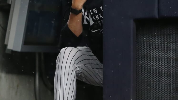 Jul 17, 2021; Bronx, New York, USA; New York Yankees manager Aaron Boone (19) watches during the sixth inning against the Boston Red Sox at Yankee Stadium. Mandatory Credit: Brad Penner-USA TODAY Sports