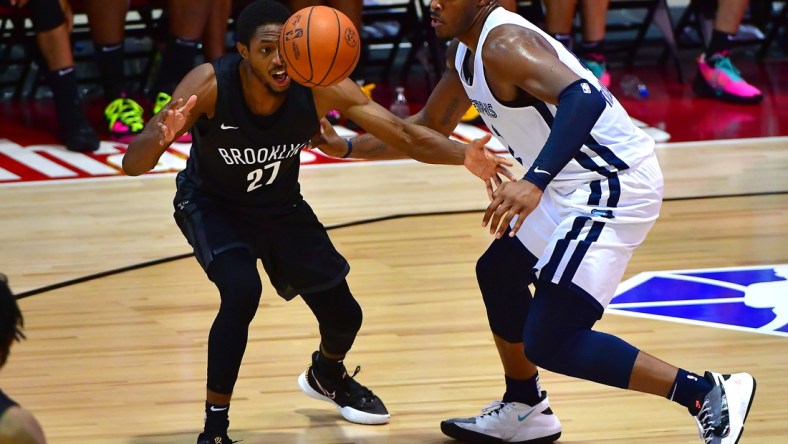 Aug 9, 2021; Las Vegas, Nevada, USA; Memphis Grizzlies center Xavier Tillman (2) knocks the ball away from Brooklyn Nets guard Brandon Knight (27) during an NBA Summer League game at Cox Pavilion. Mandatory Credit: Stephen R. Sylvanie-USA TODAY Sports