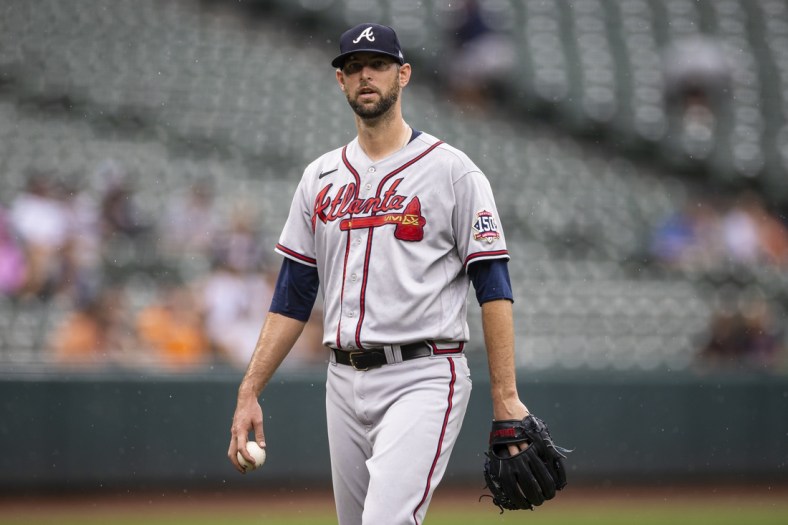 Aug 22, 2021; Baltimore, Maryland, USA; Atlanta Braves relief pitcher Chris Martin (55) reacts after being relieved against the Baltimore Orioles during the seventh inning at Oriole Park at Camden Yards. Mandatory Credit: Scott Taetsch-USA TODAY Sports