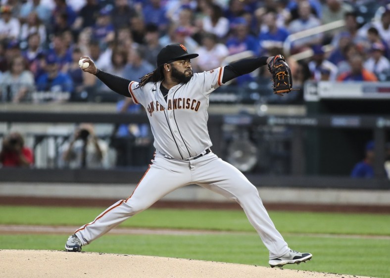 Aug 25, 2021; New York City, New York, USA;  San Francisco Giants pitcher Johnny Cueto (47) pitches in the first inning against the New York Mets at Citi Field. Mandatory Credit: Wendell Cruz-USA TODAY Sports