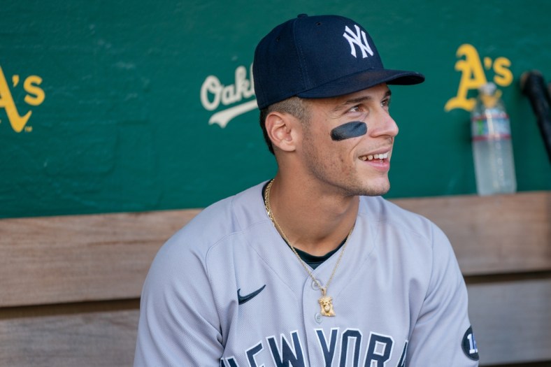 Aug 26, 2021; Oakland, California, USA;  New York Yankees shortstop Andrew Velazquez (71) looks on from the dugout before a game against the Oakland Athletics at RingCentral Coliseum. Mandatory Credit: Neville E. Guard-USA TODAY Sports