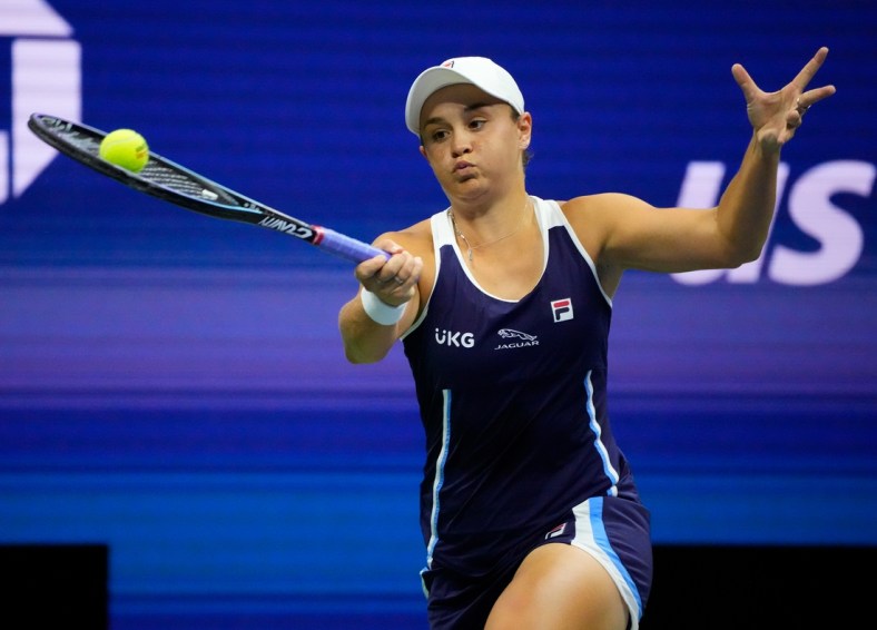 Sep 4, 2021; Flushing, NY, USA; 
Ashleigh Barty of Australia hits to Shelby Rogers of the USA on day six of the 2021 U.S. Open tennis tournament at USTA Billie Jean King National Tennis Center. Mandatory Credit: Robert Deutsch-USA TODAY Sports