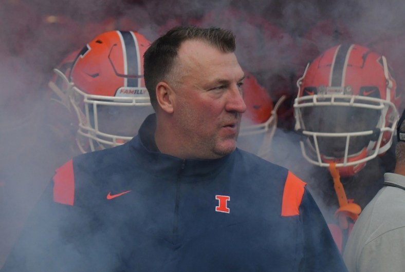 Sep 4, 2021; Champaign, Illinois, USA;  Illinois Fighting Illini head coach Bret Bielema enters the field with his team before the start of Saturday   s game with the UTSA Roadrunners at Memorial Stadium. Mandatory Credit: Ron Johnson-USA TODAY Sports