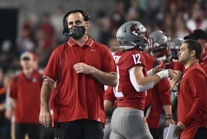 Sep 4, 2021; Pullman, Washington, USA; Washington State Cougars head coach Nick Rolovich looks during a gam e against the Utah State Aggies in the first half at Gesa Field at Martin Stadium. Mandatory Credit: James Snook-USA TODAY Sports