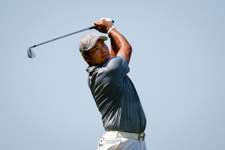Aug 26, 2021; Owings Mills, Maryland, USA; Hideki Matsuyama plays his shot from the third tee during the first round of the BMW Championship golf tournament. Mandatory Credit: Scott Taetsch-USA TODAY Sports