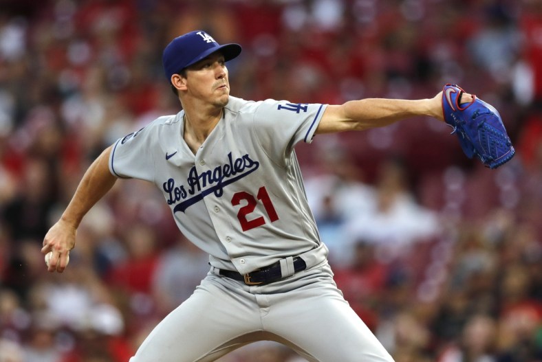 Sep 17, 2021; Cincinnati, Ohio, USA; Los Angeles Dodgers starting pitcher Walker Buehler (21) throws a pitch against the Cincinnati Reds during the first inning at Great American Ball Park. Mandatory Credit: David Kohl-USA TODAY Sports