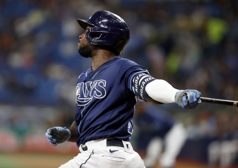 Sep 17, 2021; St. Petersburg, Florida, USA;  Tampa Bay Rays left fielder Randy Arozarena (56) doubles during the first inning against the Detroit Tigers at Tropicana Field. Mandatory Credit: Kim Klement-USA TODAY Sports