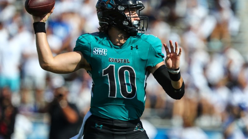 Sep 18, 2021; Buffalo, New York, USA; Coastal Carolina Chanticleers quarterback Grayson McCall (10) throws the ball against the Buffalo Bulls during the second half of play at UB Stadium. Mandatory Credit: Nicholas LoVerde-USA TODAY Sports