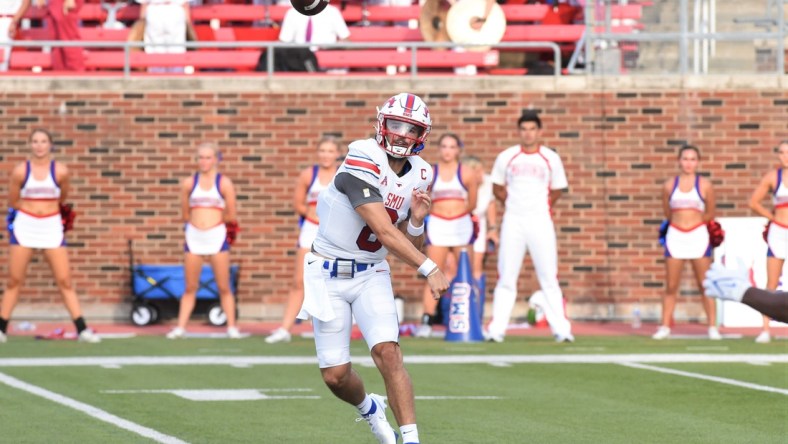 SMU quarterback Tanner Mordecai (8) lets go of a pass during Saturday's game against ACU at Gerald J. Ford Stadium in Dallas on Sept. 4, 2021. Mordecai threw an SMU-record seven touchdowns as the Mustangs won 56-9.

Hof 7364 2