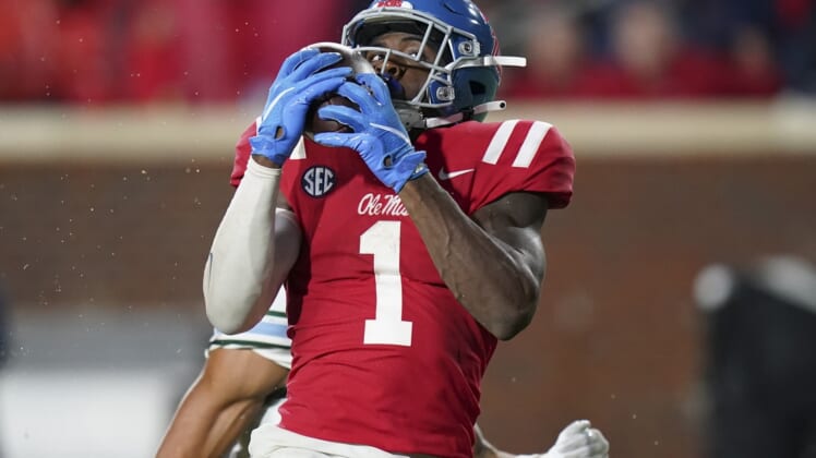 Sep 18, 2021; Oxford, Mississippi, USA; Mississippi Rebels wide receiver Jonathan Mingo (1) catches a touchdown pass against Tulane Green Wave at Vaught-Hemingway Stadium. Mandatory Credit: Marvin Gentry-USA TODAY Sports