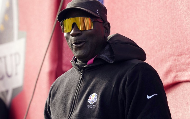 Sep 25, 2021; Haven, Wisconsin, USA; Michael Jordan watches on from the 11th green during day two four-ball rounds for the 43rd Ryder Cup golf competition at Whistling Straits. Mandatory Credit: Michael Madrid-USA TODAY Sports