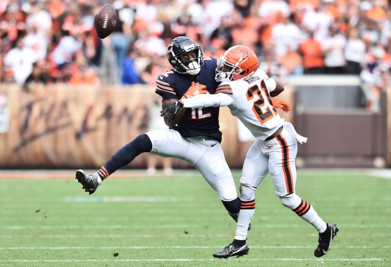 Sep 26, 2021; Cleveland, Ohio, USA; Cleveland Browns cornerback Denzel Ward (21) knocks the ball away from Chicago Bears wide receiver Allen Robinson (12) during the second half at FirstEnergy Stadium. Mandatory Credit: Ken Blaze-USA TODAY Sports