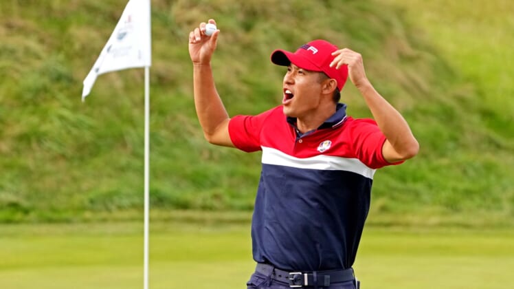 Sep 26, 2021; Haven, Wisconsin, USA; Team USA player Collin Morikawa reacts to his putt on the 17th green during day two four-ball rounds for the 43rd Ryder Cup golf competition at Whistling Straits. Mandatory Credit: Kyle Terada-USA TODAY Sports