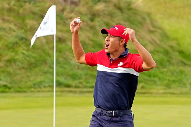 Sep 26, 2021; Haven, Wisconsin, USA; Team USA player Collin Morikawa reacts to his putt on the 17th green during day two four-ball rounds for the 43rd Ryder Cup golf competition at Whistling Straits. Mandatory Credit: Kyle Terada-USA TODAY Sports