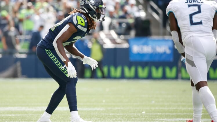 Sep 19, 2021; Seattle, Washington, USA; Seattle Seahawks cornerback Tre Flowers (21) waits for a snap against the Tennessee Titans during the second quarter at Lumen Field. Mandatory Credit: Joe Nicholson-USA TODAY Sports