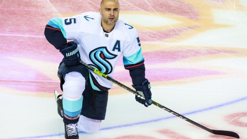 Sep 29, 2021; Calgary, Alberta, CAN; Seattle Kraken defenseman Mark Giordano (5) during the warmup period against the Calgary Flames at Scotiabank Saddledome. Mandatory Credit: Sergei Belski-USA TODAY Sports