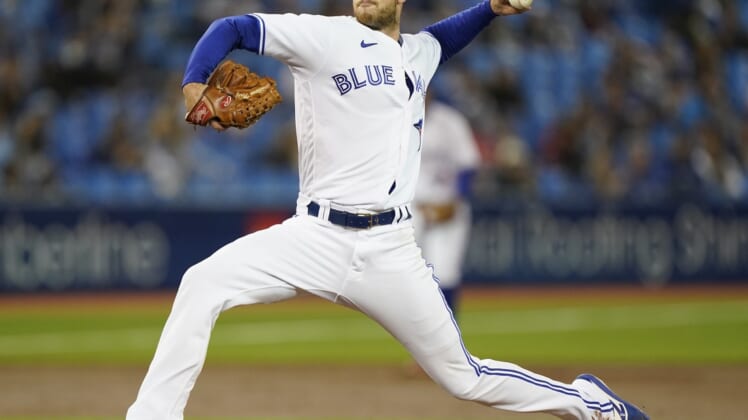 Oct 1, 2021; Toronto, Ontario, CAN; Toronto Blue Jays starting pitcher Steven Matz (22) pitches to the Baltimore Orioles during the second inning at Rogers Centre. Mandatory Credit: John E. Sokolowski-USA TODAY Sports