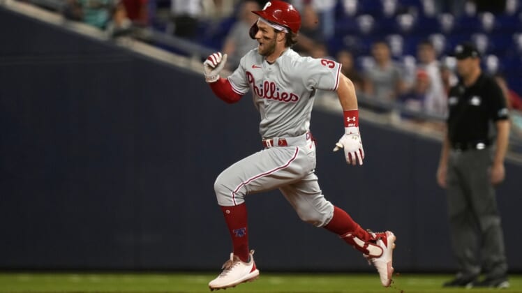 Oct 1, 2021; Miami, Florida, USA; Philadelphia Phillies right fielder Bryce Harper (3) runs to second base for a RBI double against the Miami Marlins in the 3rd inning at loanDepot park. Mandatory Credit: Jasen Vinlove-USA TODAY Sports