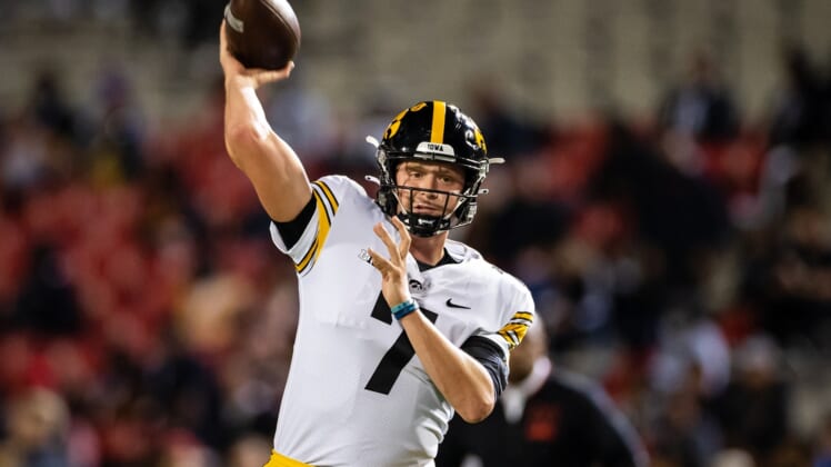 Oct 1, 2021; College Park, Maryland, USA; Iowa Hawkeyes quarterback Spencer Petras (7) warms up before the game against the Maryland Terrapins at Capital One Field at Maryland Stadium. Mandatory Credit: Scott Taetsch-USA TODAY Sports