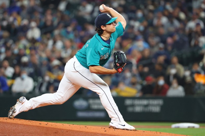 Oct 1, 2021; Seattle, Washington, USA;  Seattle Mariners starting pitcher Marco Gonzales (7) pitches against the Los Angeles Angels during the first inning at T-Mobile Park. Mandatory Credit: Abbie Parr-USA TODAY Sports