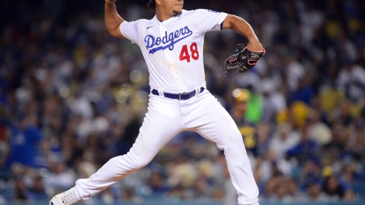 Oct 1, 2021; Los Angeles, California, USA; Los Angeles Dodgers relief pitcher Brusdar Graterol (48) throws against the Milwaukee Brewers during the third inning at Dodger Stadium. Mandatory Credit: Gary A. Vasquez-USA TODAY Sports