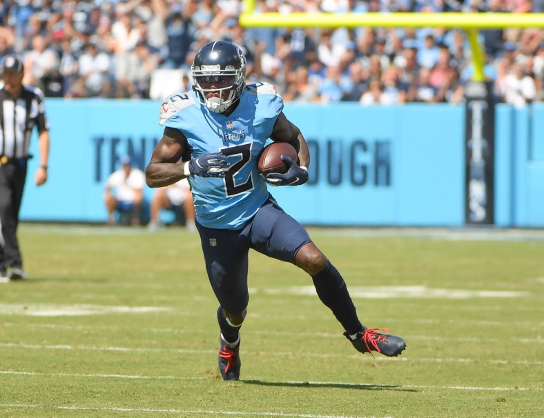 Sep 26, 2021; Nashville, Tennessee, USA;  Tennessee Titans wide receiver Julio Jones (2) runs the ball during the first half at Nissan Stadium. Mandatory Credit: Steve Roberts-USA TODAY Sports