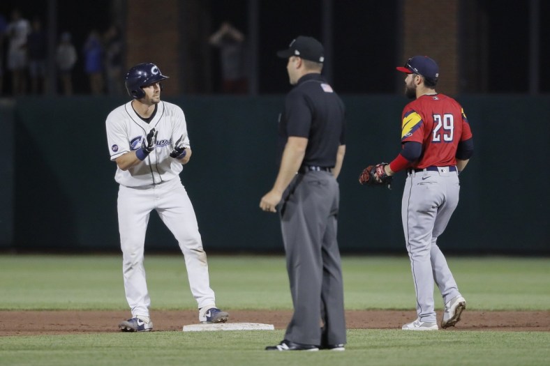 Columbus Clippers catcher Ryan Lavarnway (36) claps in front of Toledo Mud Hens first baseman Renato Nunez (29) after hitting a double in the ninth inning during the AAA minor league baseball game at Huntington Park in Columbus on Tuesday, June 15, 2021.

Columbus Clippers Vs Toledo Mudhens