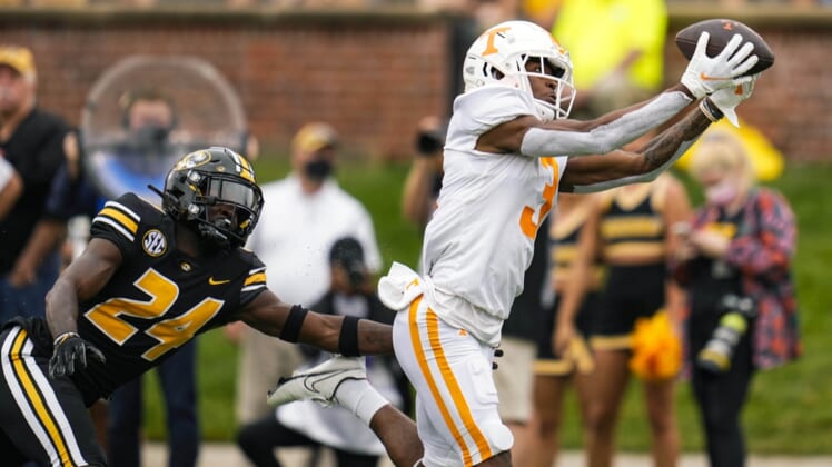 Oct 2, 2021; Columbia, Missouri, USA; Tennessee Volunteers wide receiver JaVonta Payton (3) catches a touchdown pass against Missouri Tigers defensive back Allie Green IV (24) during the first half at Faurot Field at Memorial Stadium. Mandatory Credit: Jay Biggerstaff-USA TODAY Sports